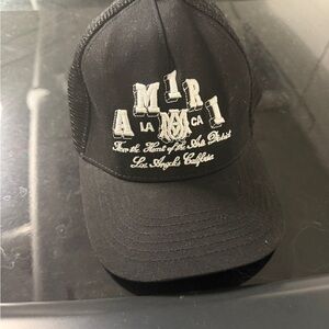 AMIRI Black and White Logo Trucker Hat